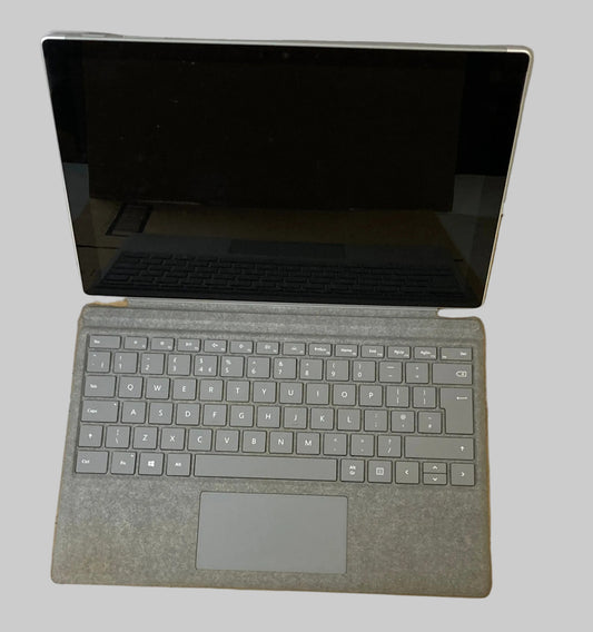 Microsoft Surface Pro 5. Intel Core m3-7Y30. 4GB RAM. 128GB SSD. Tablet only. No charger. Win 11